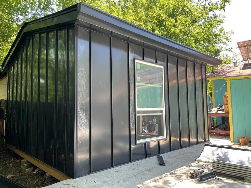 Black standing seam metal wall panels for Metal Roof Installation in St. Louis