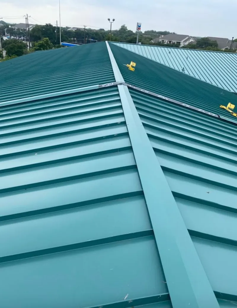 Green commercial metal roof ridge and valley for Metal Roof Repair in St. Louis